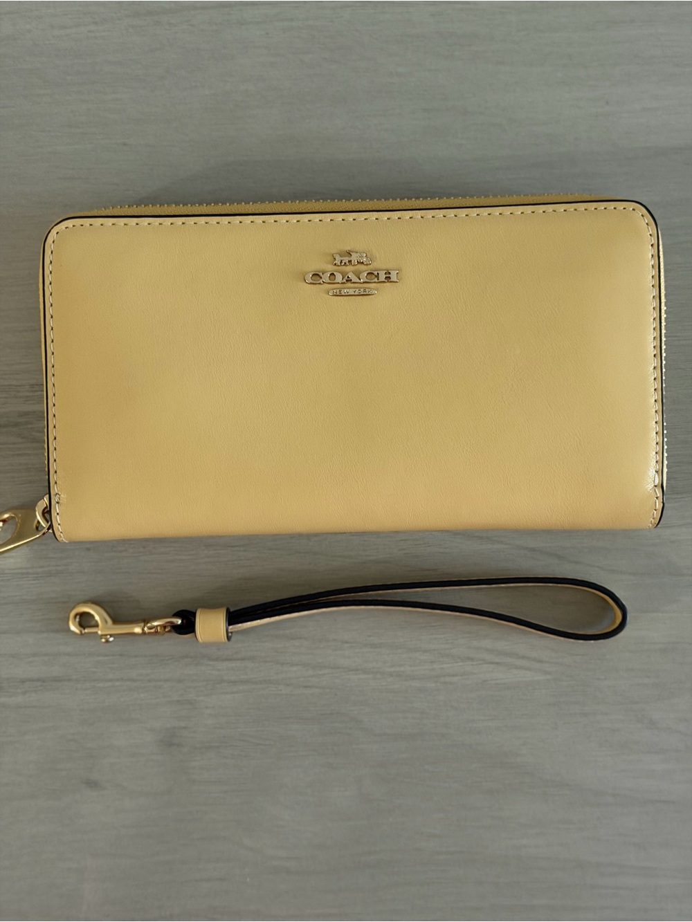 Coach Pale Yellow Leather Zip Wristlet Wallet with Gold Logo